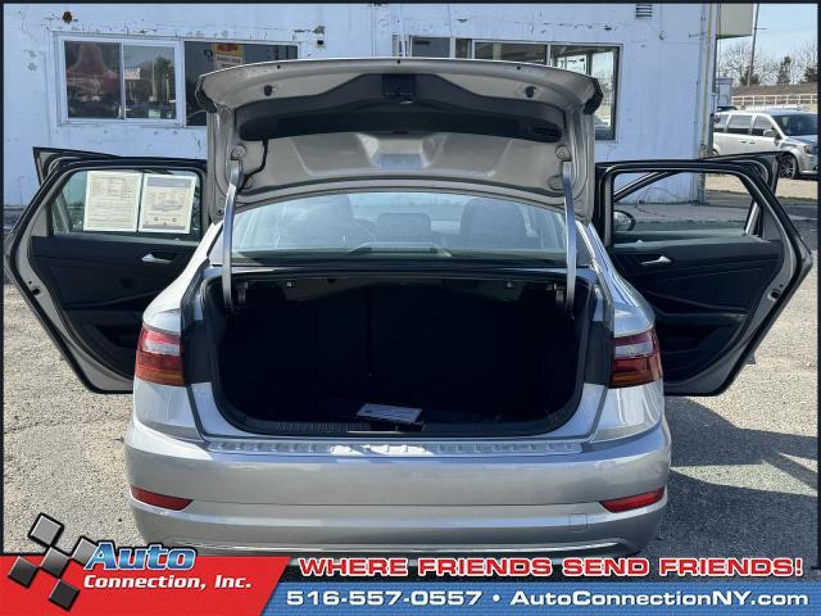 2019 Pyrite Silver Metallic /Titan Black Volkswagen Jetta S Auto w/SULEV (3VWC57BU6KM) , Automatic transmission, located at 2860 Sunrise Hwy, Bellmore, NY, 11710, (516) 557-0557, 40.669529, -73.522118 - Form meets function with the 2019 Volkswagen Jetta. This Jetta has 69185 miles, and it has plenty more to go with you behind the wheel. At Auto Connection, we don't just sell cars; we take care of our customers' needs first. Experience it for yourself now. All internet purchases include a 12 mo/ 12 - Photo #11