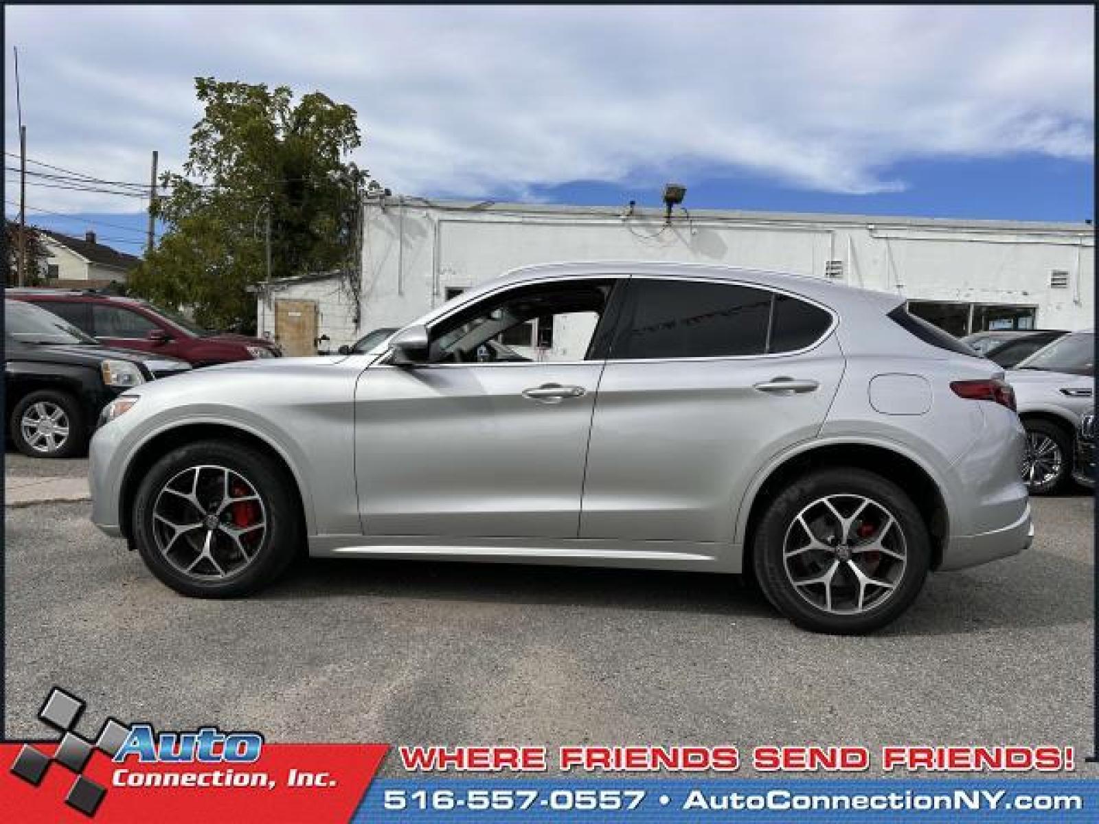2021 Silverstone Gray Metallic /Black/Red Alfa Romeo Stelvio Ti AWD (ZASPAKBNXM7) , Automatic transmission, located at 2860 Sunrise Hwy, Bellmore, NY, 11710, (516) 557-0557, 40.669529, -73.522118 - You'll enjoy the open roads and city streets in this 2021 Alfa Romeo Stelvio. This Stelvio offers you 22194 miles, and will be sure to give you many more. We're happy to help you become this Stelvio's proud owner. Start driving today. All internet purchases include a 12 mo/ 12000 mile protection pl - Photo #4