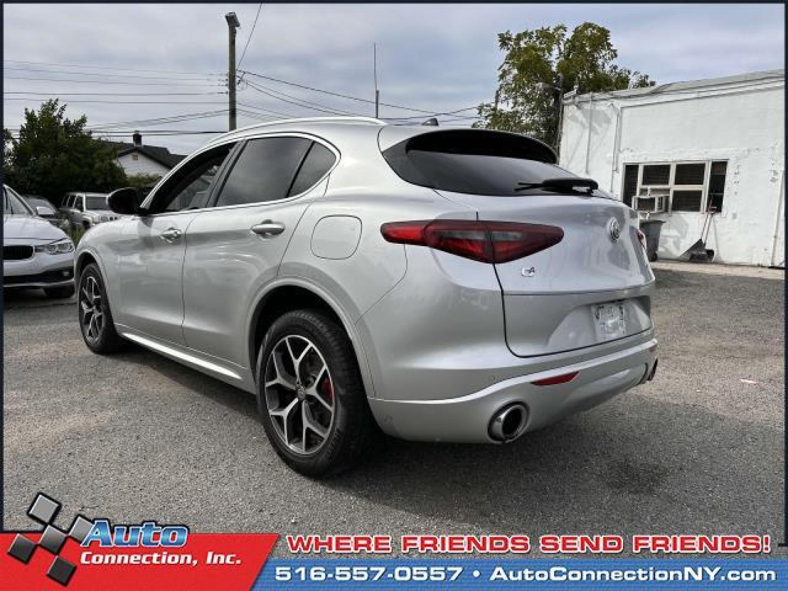 2021 Silverstone Gray Metallic /Black/Red Alfa Romeo Stelvio Ti AWD (ZASPAKBNXM7) , Automatic transmission, located at 2860 Sunrise Hwy, Bellmore, NY, 11710, (516) 557-0557, 40.669529, -73.522118 - You'll enjoy the open roads and city streets in this 2021 Alfa Romeo Stelvio. This Stelvio offers you 22194 miles, and will be sure to give you many more. We're happy to help you become this Stelvio's proud owner. Start driving today. All internet purchases include a 12 mo/ 12000 mile protection pl - Photo #5