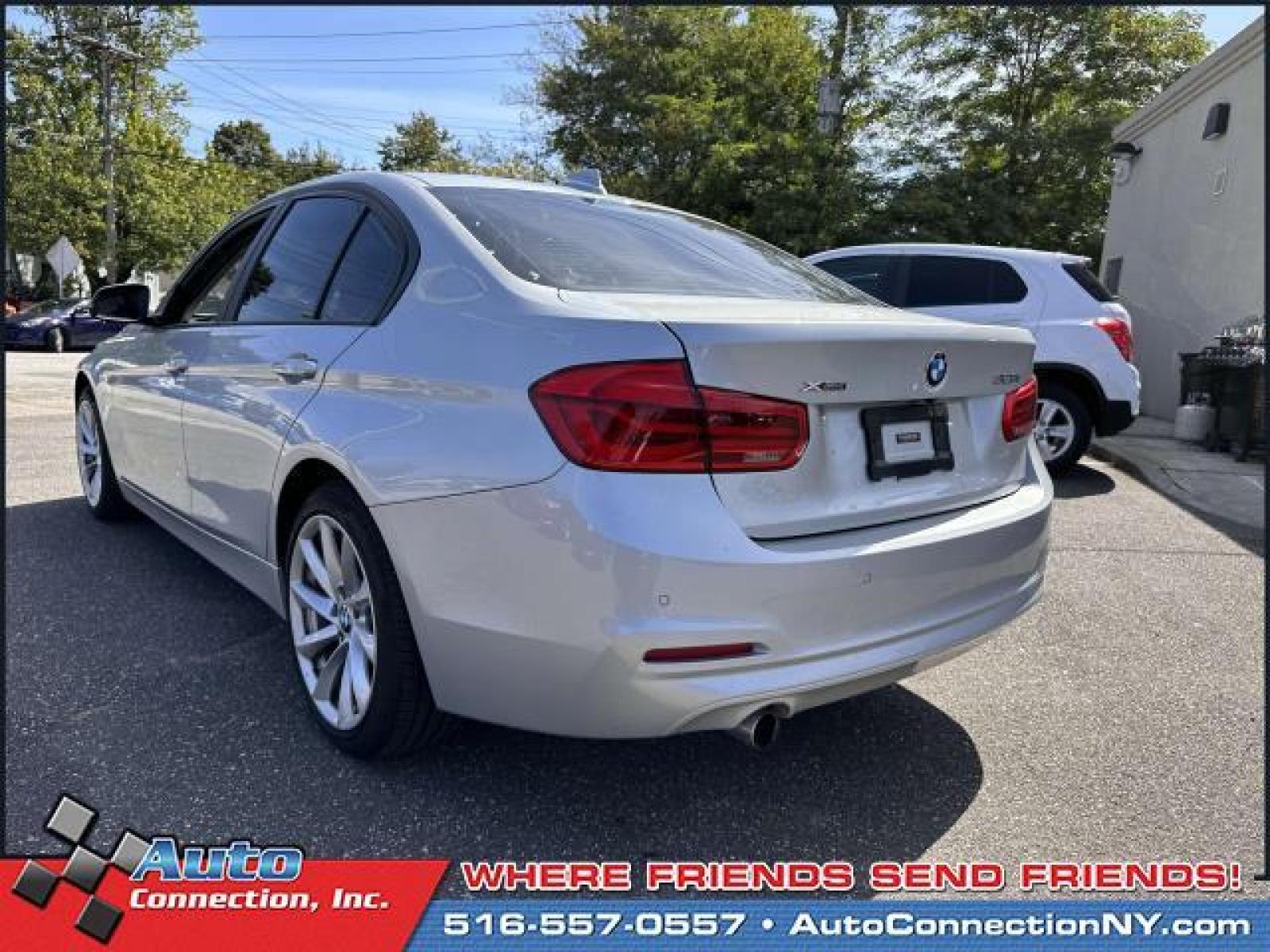 2018 Glacier Silver Metallic /Black BMW 3 Series 320i xDrive Sedan (WBA8A3C59JA) , Automatic transmission, located at 2860 Sunrise Hwy, Bellmore, NY, 11710, (516) 557-0557, 40.669529, -73.522118 - You'll feel like a new person once you get behind the wheel of this 2018 BMW 3 Series. This 3 Series has traveled 38728 miles, and is ready for you to drive it for many more. We're overstocked and ready to make deals with all of our customers. Don't risk the regrets. Test drive it today! All intern - Photo #5