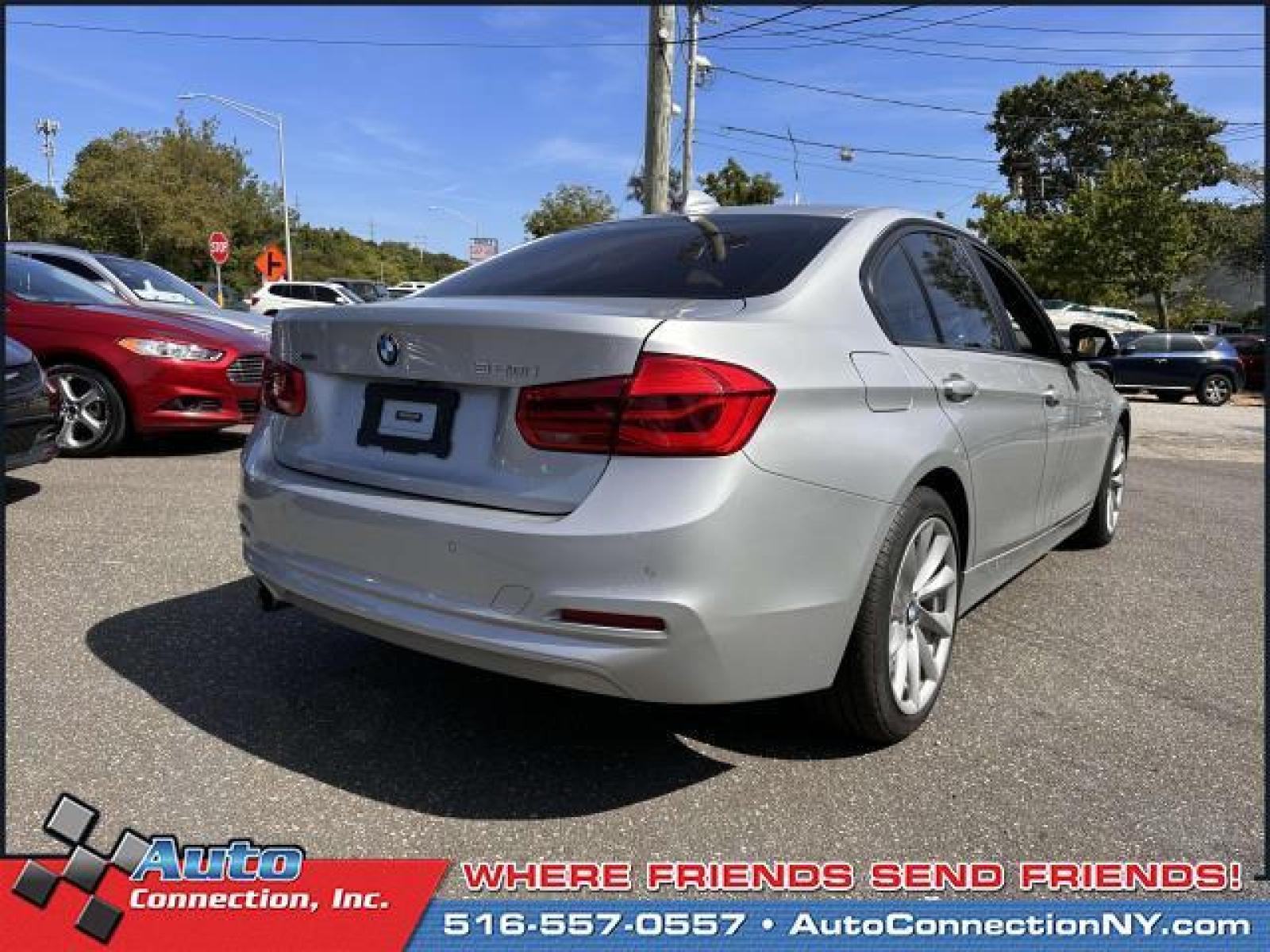 2018 Glacier Silver Metallic /Black BMW 3 Series 320i xDrive Sedan (WBA8A3C59JA) , Automatic transmission, located at 2860 Sunrise Hwy, Bellmore, NY, 11710, (516) 557-0557, 40.669529, -73.522118 - You'll feel like a new person once you get behind the wheel of this 2018 BMW 3 Series. This 3 Series has traveled 38728 miles, and is ready for you to drive it for many more. We're overstocked and ready to make deals with all of our customers. Don't risk the regrets. Test drive it today! All intern - Photo #6